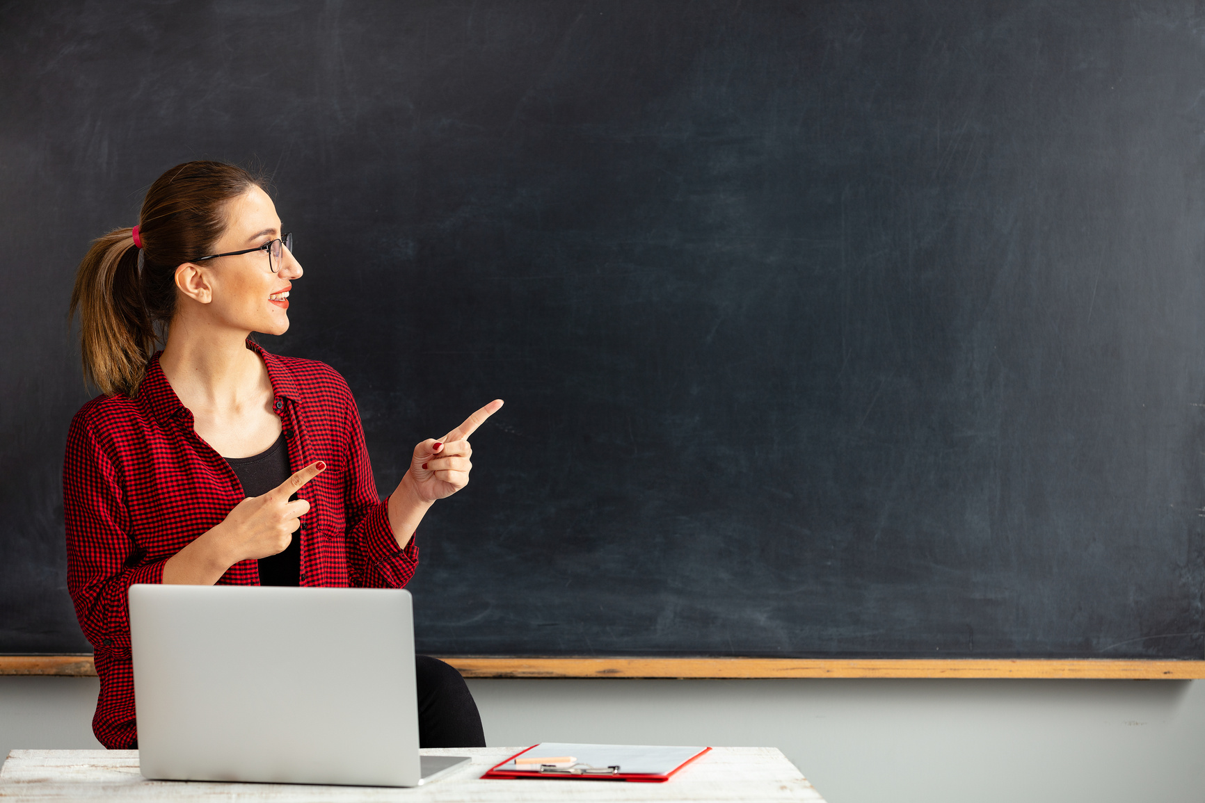 Teacher and Blackboard